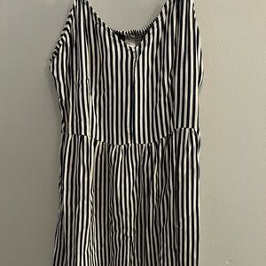 Dark navy blue and white stripped strap dress. Runs Medium but is stretchy